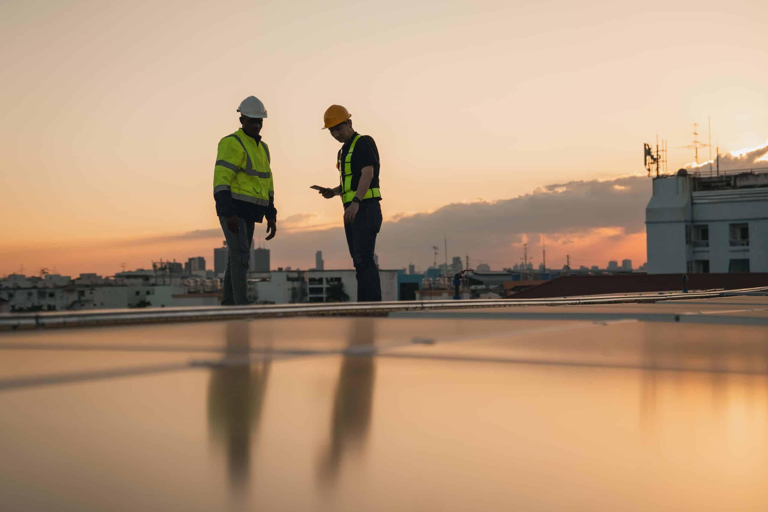 service-engineer-checking-solar-cell-on-the-roof-f-2024-02-19-22-01-45-utc