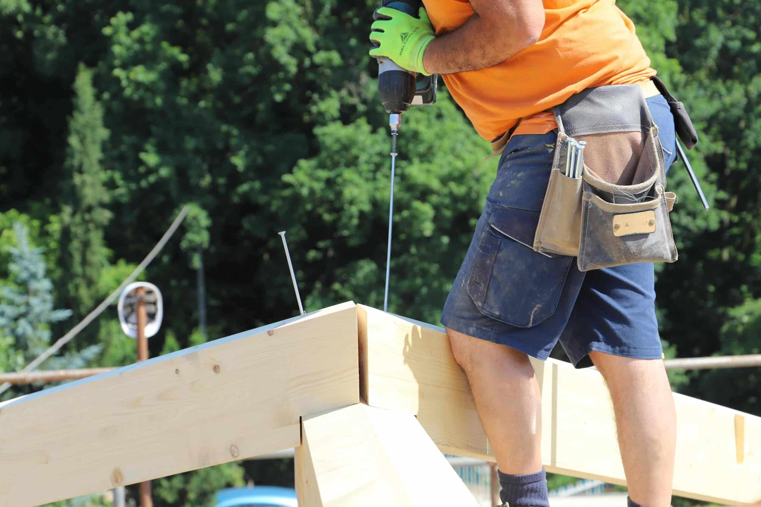 renovating-a-roof-construction-site-workers-at-2024-02-23-04-01-56-utc